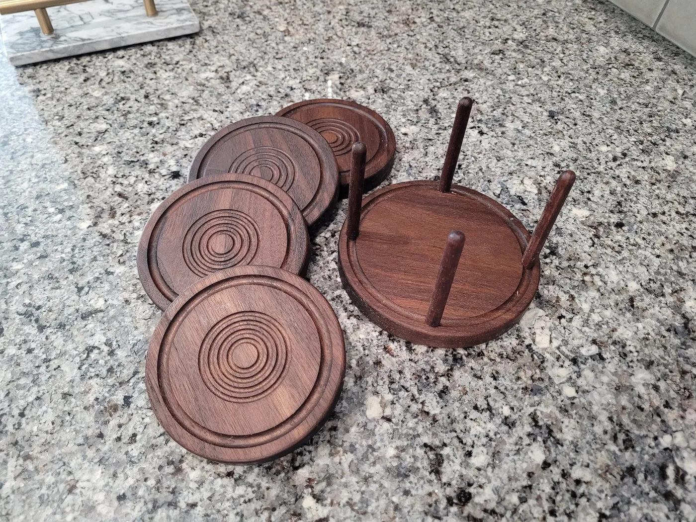 Natural round wooden coasters with matching stand